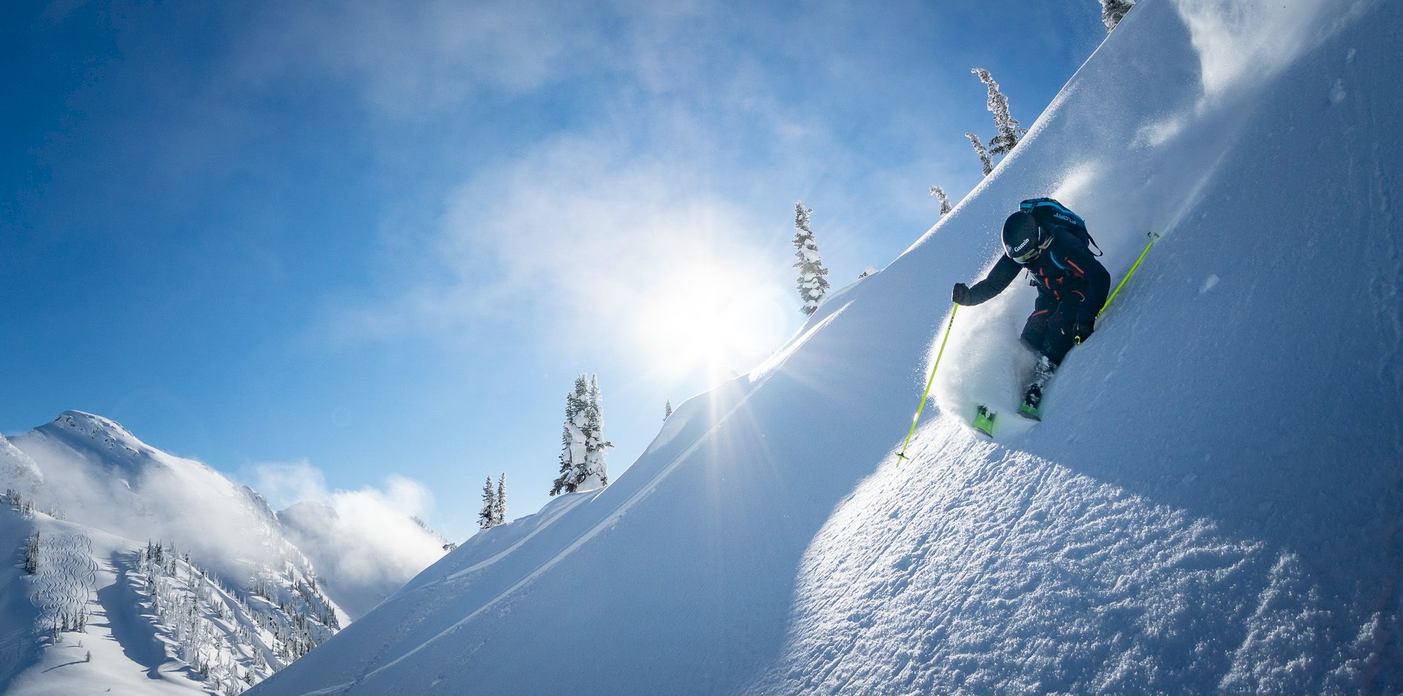 Bluebird powder day heli skiing in British Columbia at Stellar Heliskiing