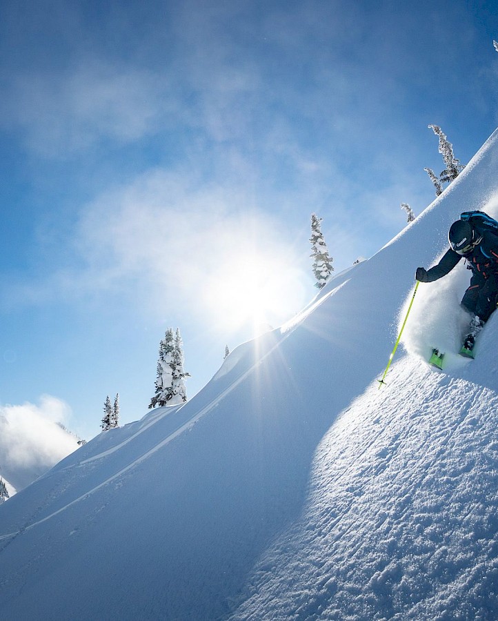 Bluebird powder day heli skiing in British Columbia at Stellar Heliskiing